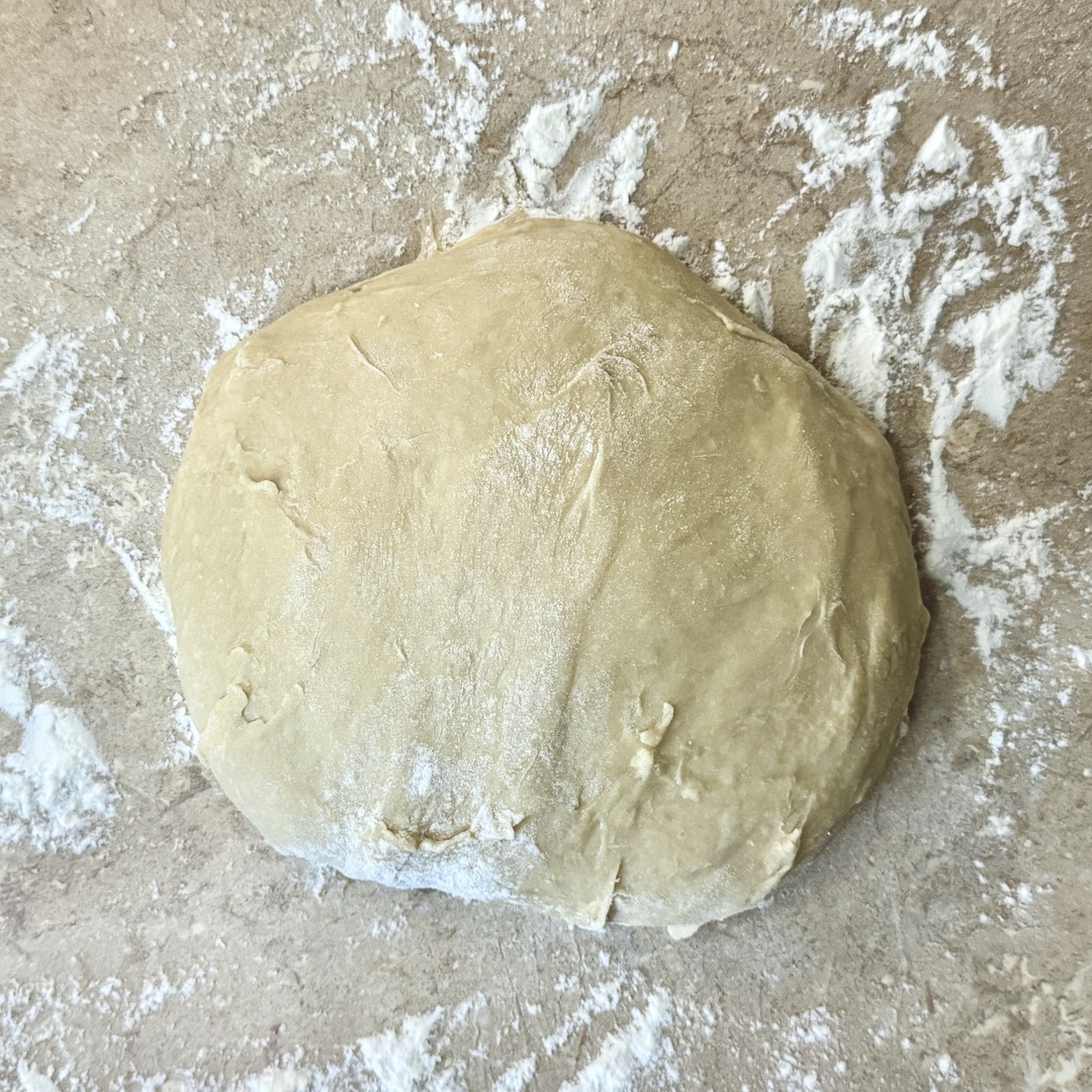 Cinnamon Roll Dough on Floured Surface