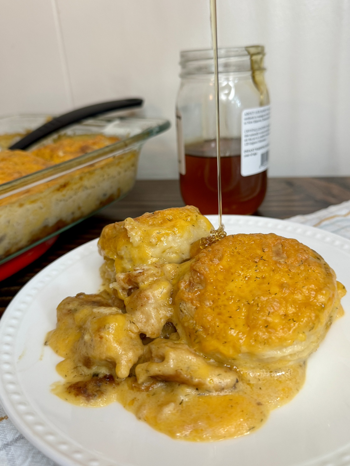 Drizzle of honey on the chicken and biscuits