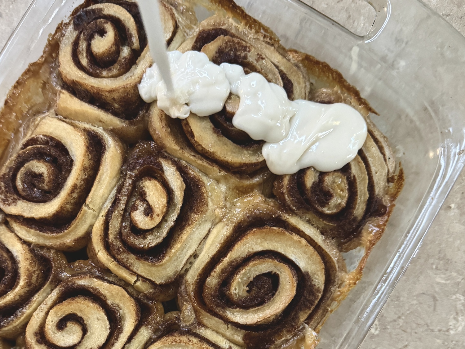 Add icing to your Sourdough Cinnamon rolls