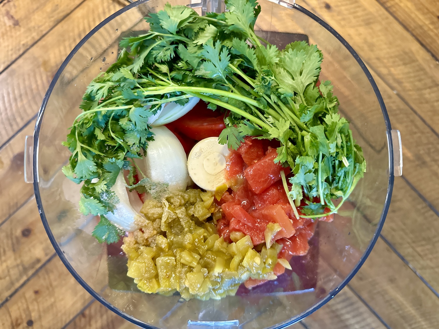 Salsa ingredients added to food processor