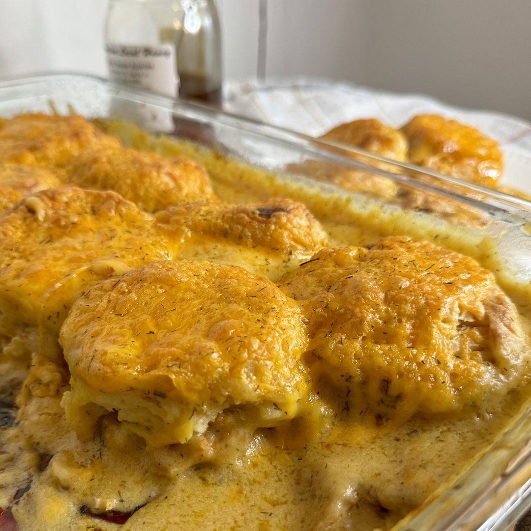 Chicken and biscuits in baking dish