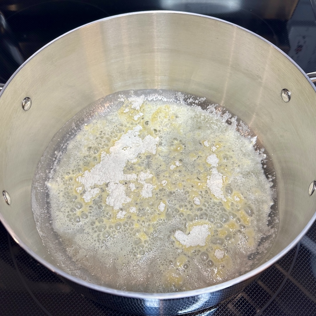 sprinkle in flour to melted butter to make roux