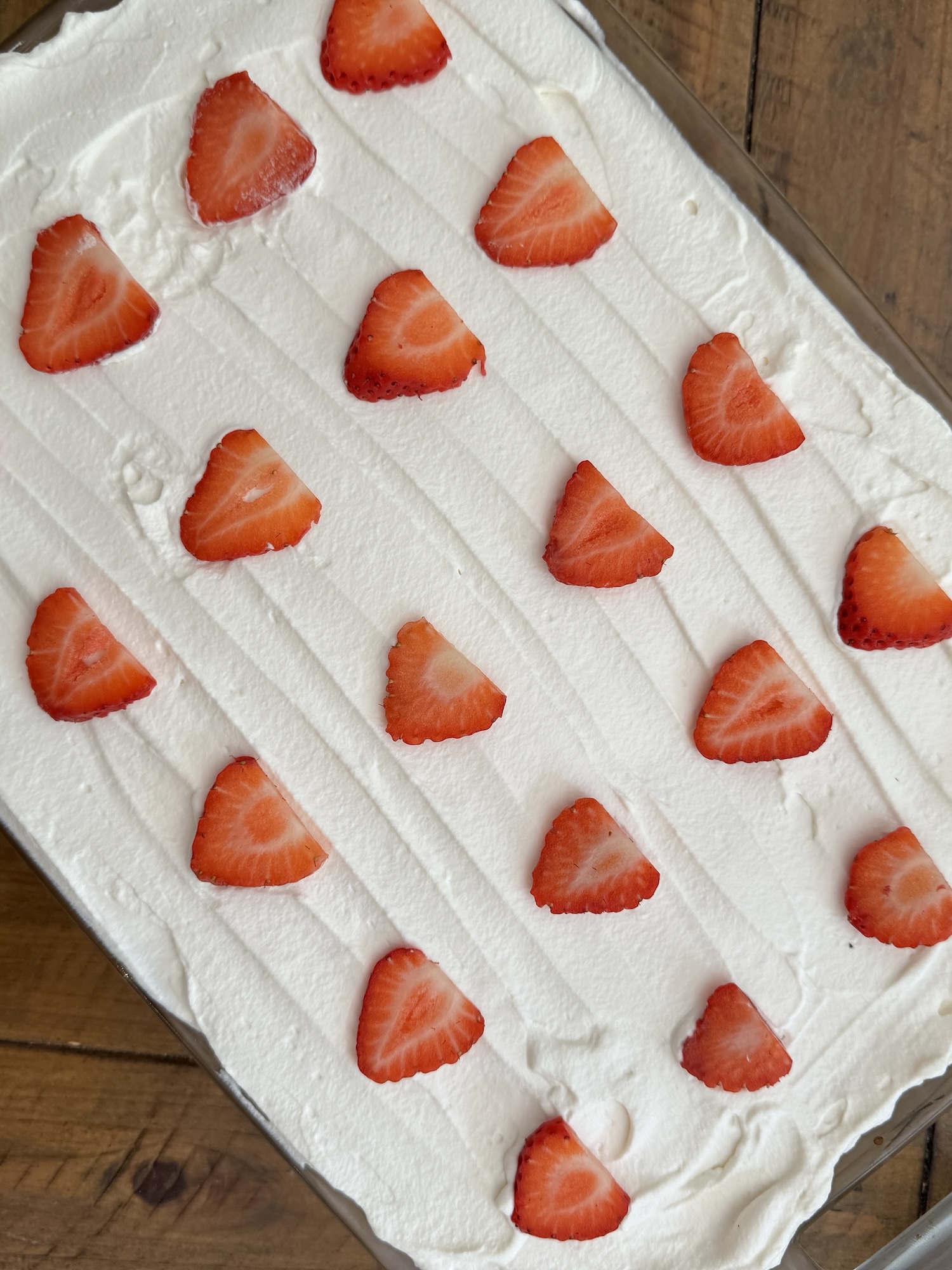 Tres leches with strawberry slices.