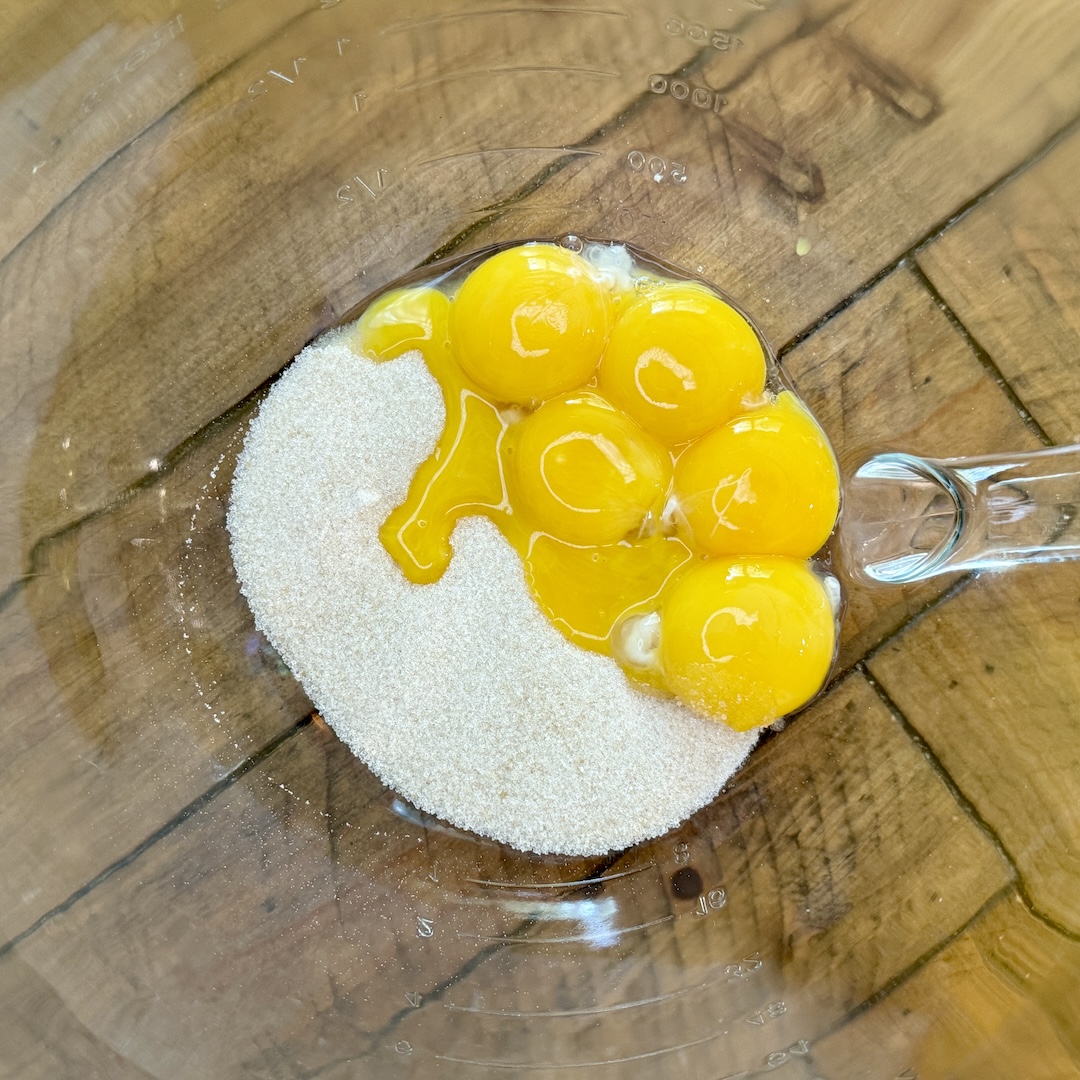 Sugar and egg yolks before being beaten for tres leches cake.