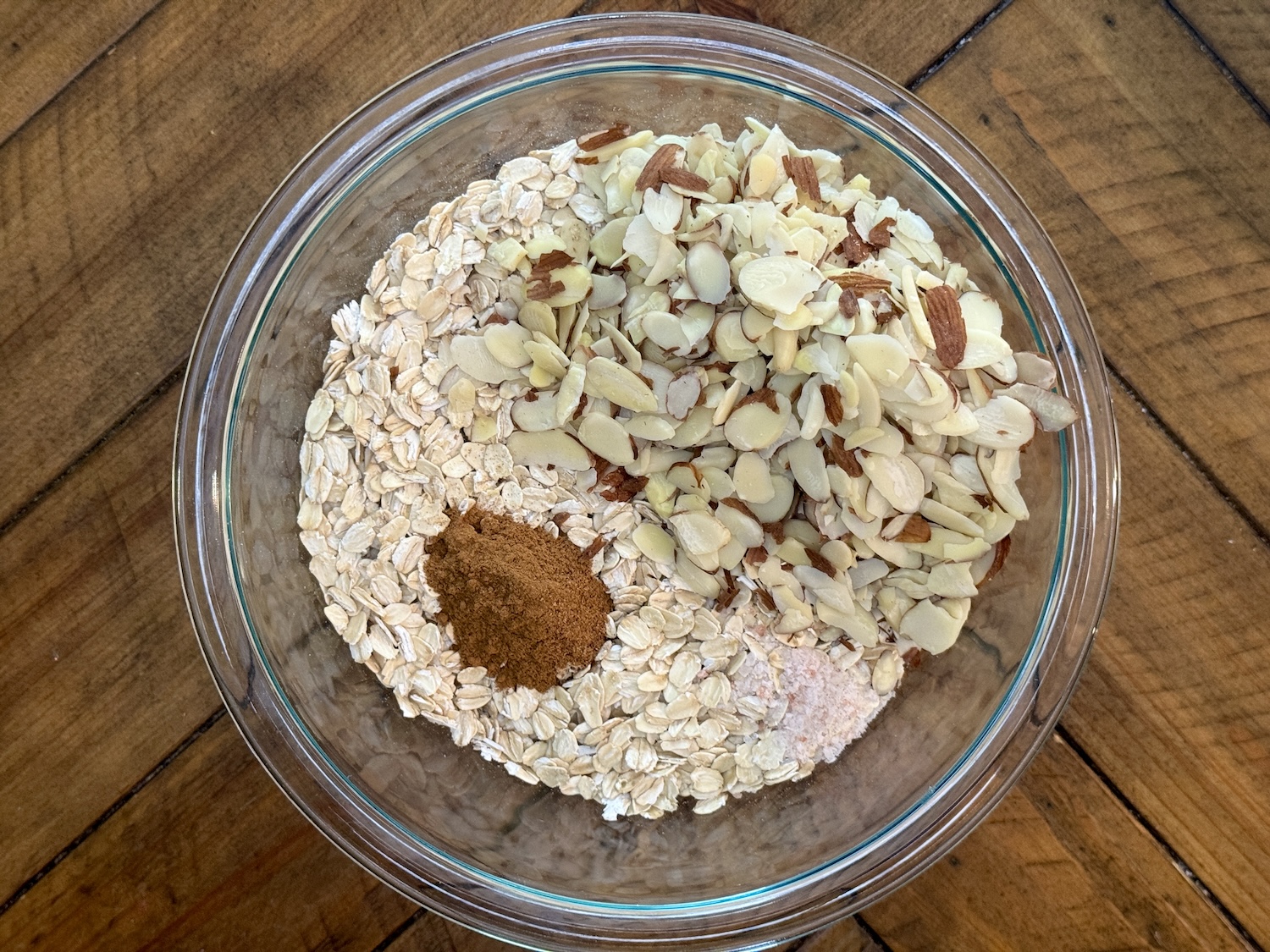 Dry ingredients for blueberry muffin granola in a bowl.